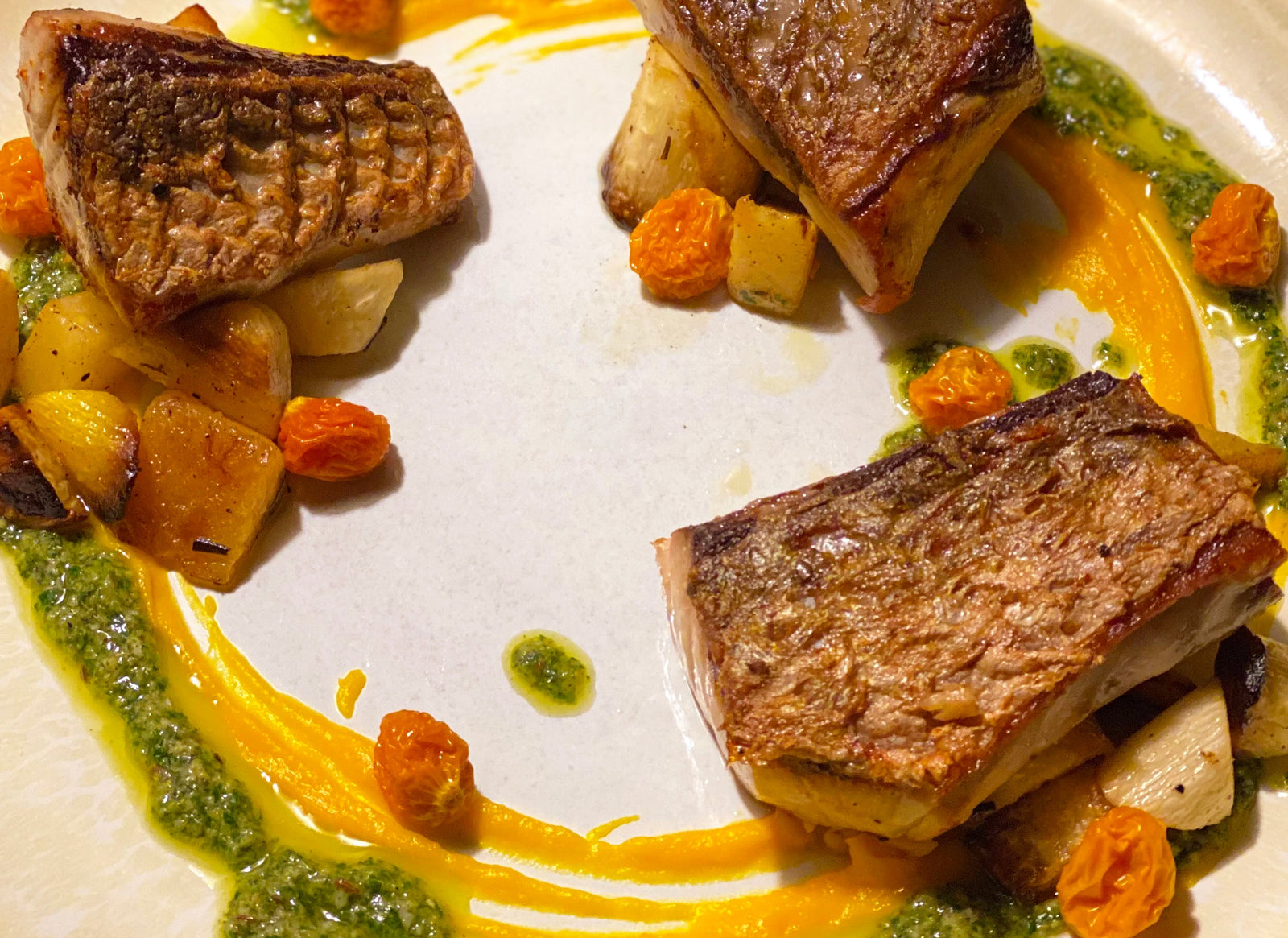 Chefs at Home: Red Drum with Roasted Root Vegetables, Carrot Puree, and Chermoula