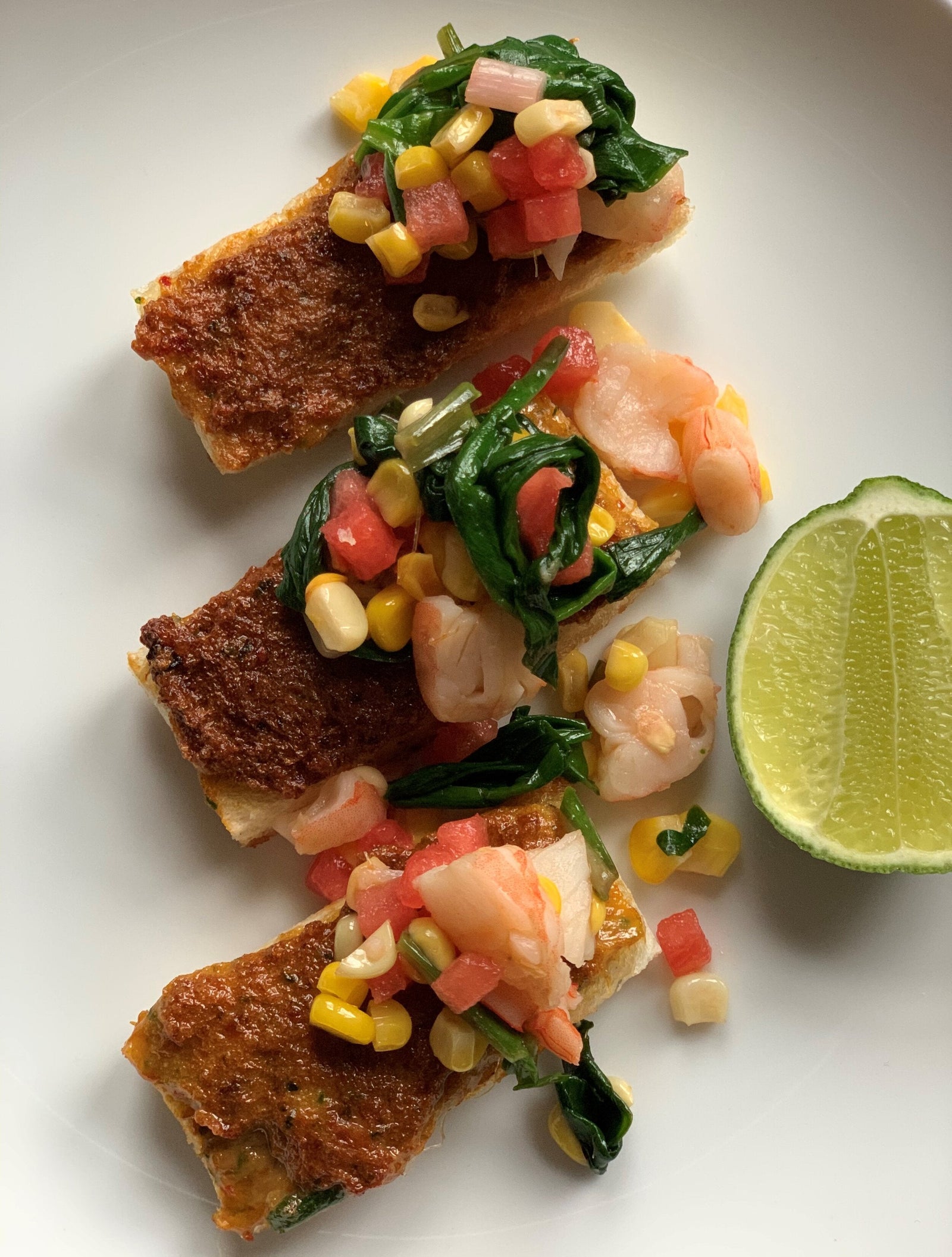 Chefs at Home: Harissa Shrimp Toast with Grilled Corn and Ramp Salad